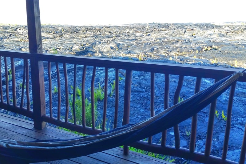 Airbnb in Puna Hawaii, in kalapana. balcony with lava field views. hammock. where to see lava fields in hawaii. Where to stay on the Big Island. Hawaii travel blog