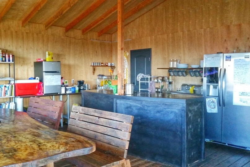 Airbnb in Puna Hawaii, in kalapana. common area with kitchen and dining. Where to stay on the Big Island. Hawaii travel blog