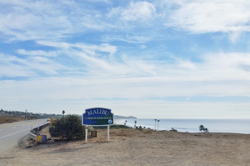 One day trip to Malibu without a car. Best things to do in Malibu in one day itinerary - Malibu sign, 21 miles of scenic beauty Pacific Coast Highway PCH. from Los Angeles LA Santa Monica. California travel blog