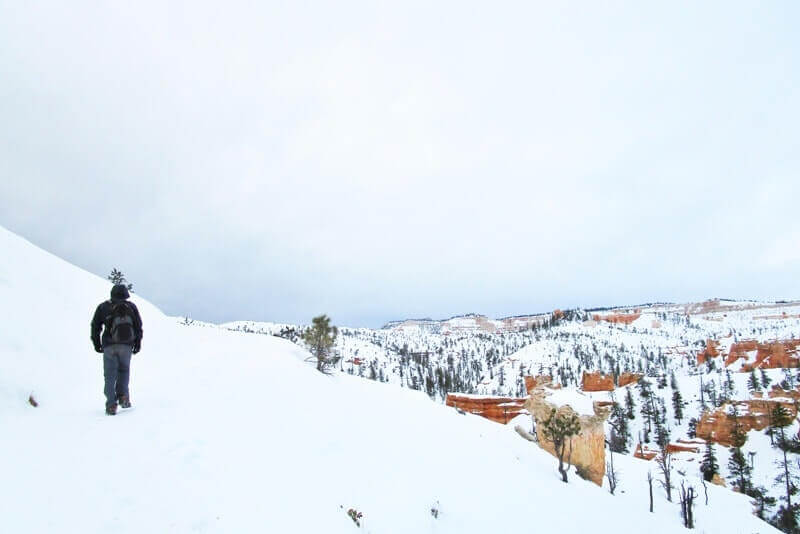best national parks in winter: snow in national parks in October, November, December, January, February, March, April. Arizona Utah road trip national park travel blog