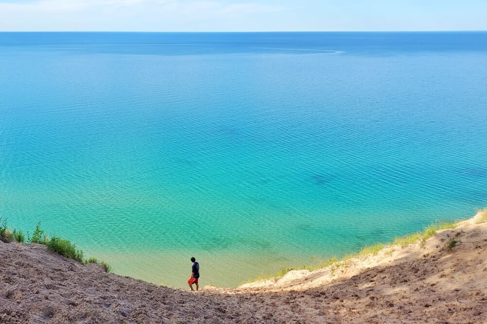 Log slide overlook sand dunes. Best things to do in Pictured Rocks National Lakeshore for views of Lake Superior. UP Michigan travel blog.