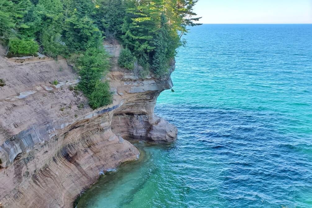 Munising to Marquette drive, from Pictured Rocks cliffs. Lake Superior circle tour, UP road trip. Michigan travel blog