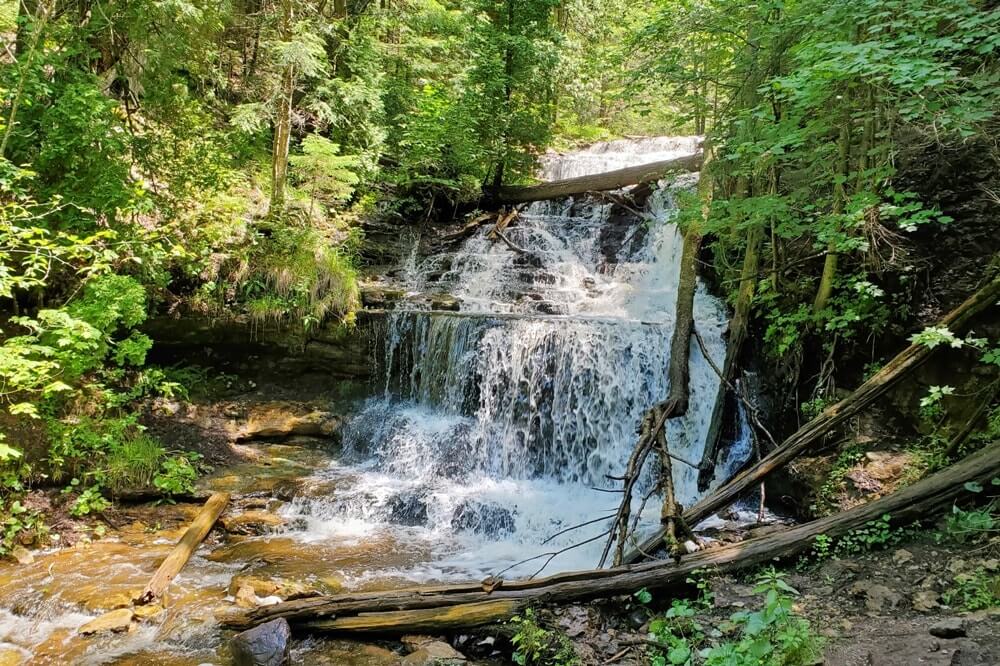 Munising to Marquette drive, things to do: wagner falls waterfalls. Lake Superior circle tour, UP road trip. Michigan travel blog
