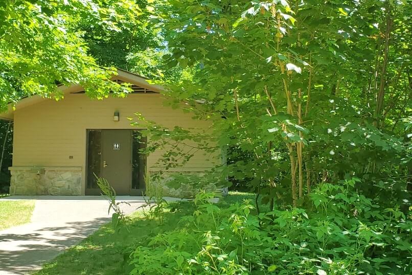 Sable Falls Trail bathrooms, toilet, near trailhead parking lot in Pictured Rocks. UP Michigan travel blog