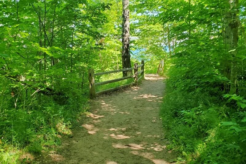 Sable Falls Trail hiking to waterfalls. forest waterfall hike in Pictured Rocks. UP Michigan travel blog