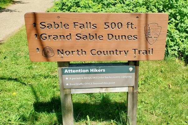 Sable Falls Trail hiking to waterfalls. forest waterfall hike in Pictured Rocks. UP Michigan travel blog