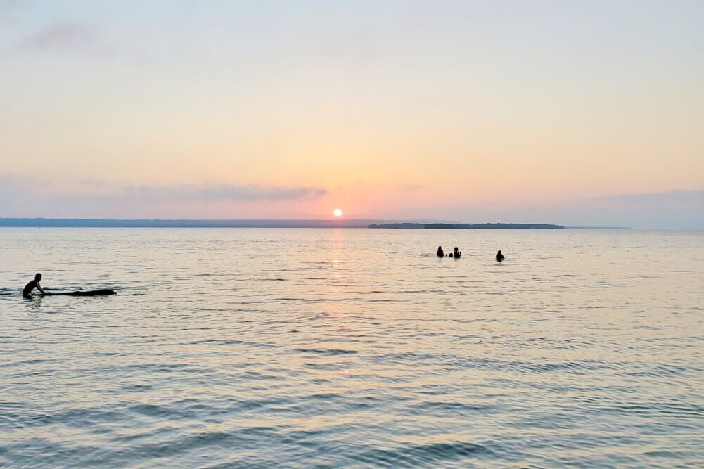 Things to do in Eastern UP: Brimley State Park swimming Lake Superior sunset. UP Michigan travel blog