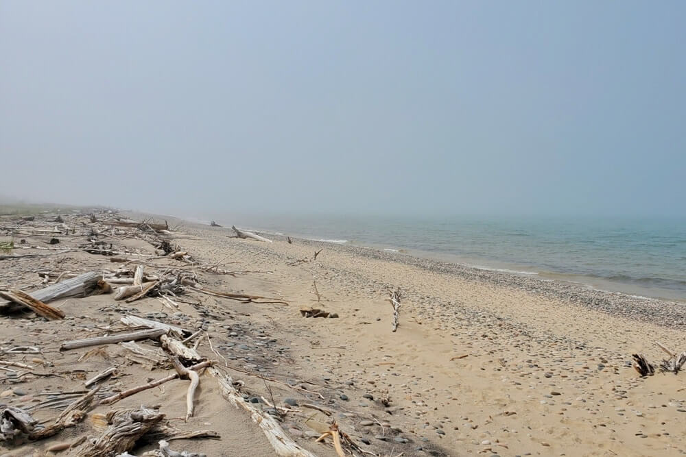 Things to do in Eastern UP: vermilion point beach lake superior. UP Michigan travel blog