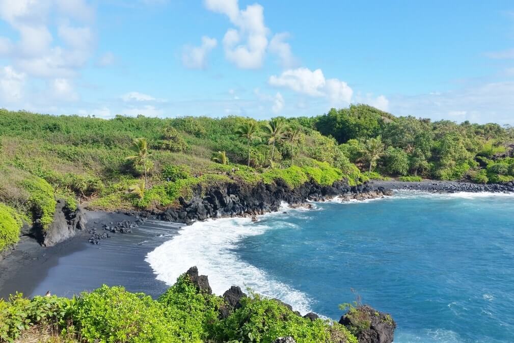 Best things to do in Waianapanapa State Park: See the best Maui black sand beach, Honokalani Beach, Pailoa Bay. Best Maui state park. Best road to hana stops. Maui hawaii travel blog