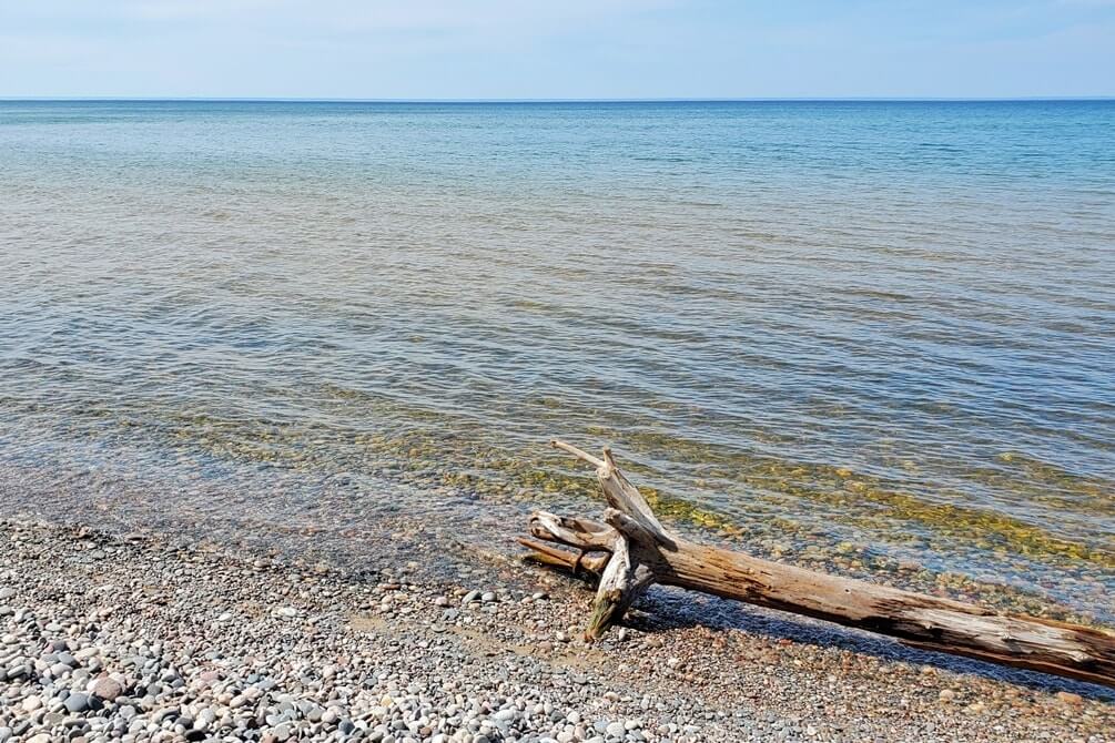 Crisp Point: Best Lake Superior beaches to visit in Upper Peninsula, near Crisp Point lighthouse. Best Michigan beaches. UP michigan travel blog