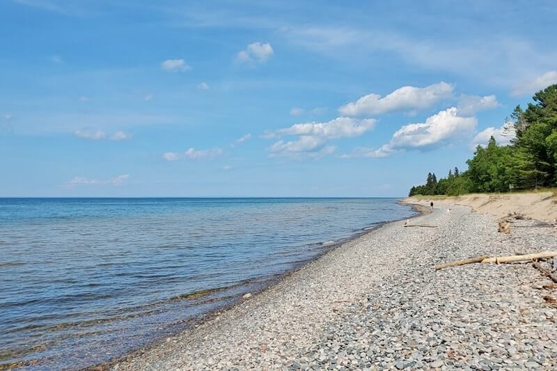 Crisp Point: Best Lake Superior beaches to visit in Upper Peninsula, near Crisp Point lighthouse. Best Michigan beaches. UP michigan travel blog
