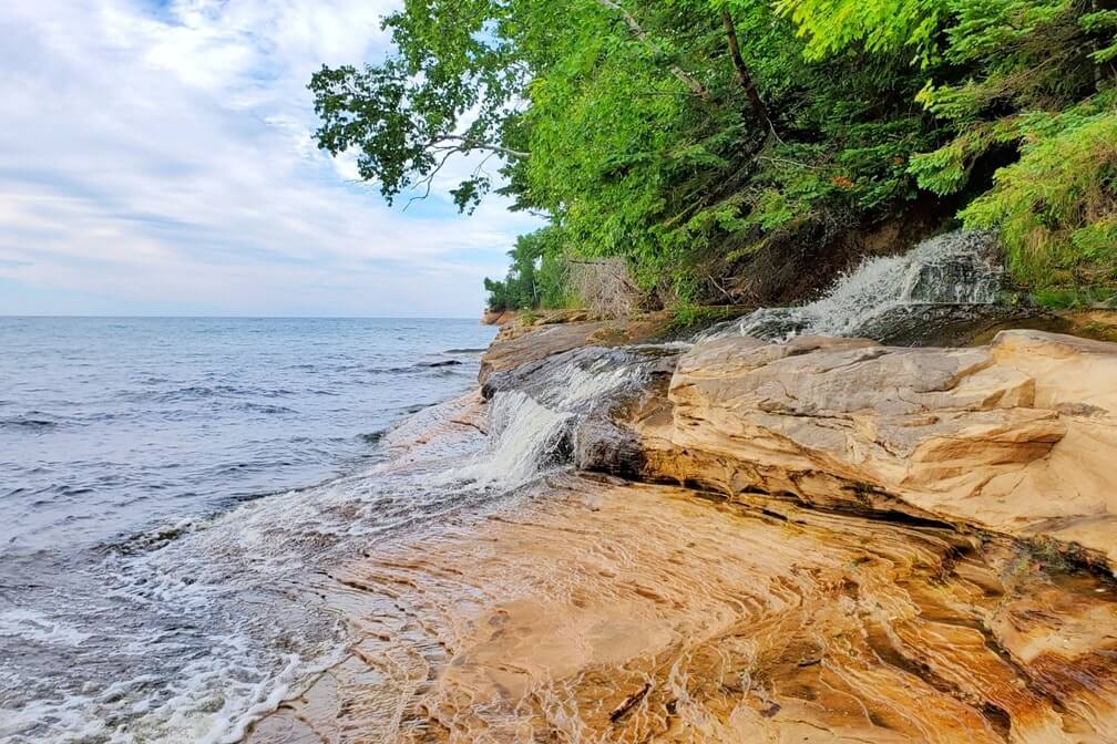 Things to do in Pictured Rocks National Lakeshore park: elliott falls, miners beach falls. UP Michigan travel blog