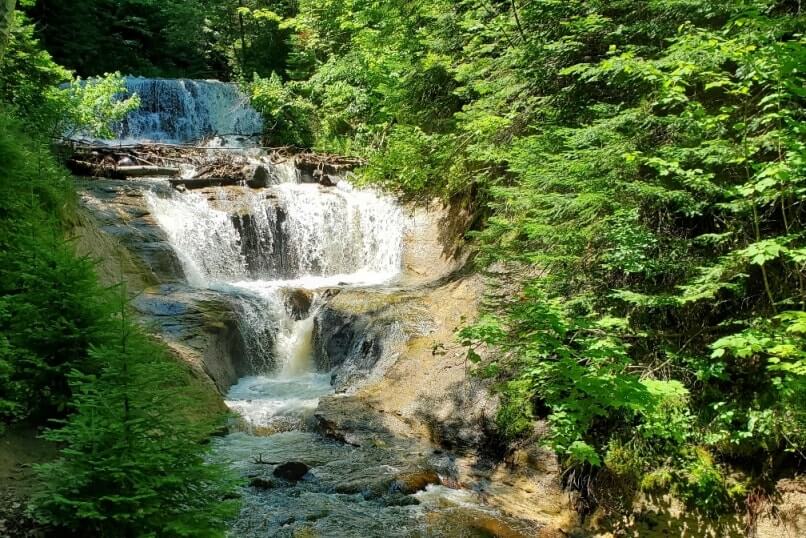 Things to do in Pictured Rocks National Lakeshore park: Sable Falls, waterfalls hiking trail. UP Michigan travel blog