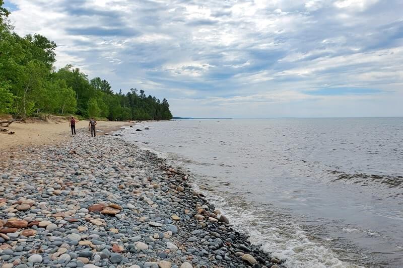 Beach near Hurricane River campground: colorful rocks at Hurricane River beach, lake superior. look for agate stones. up michigan travel blog