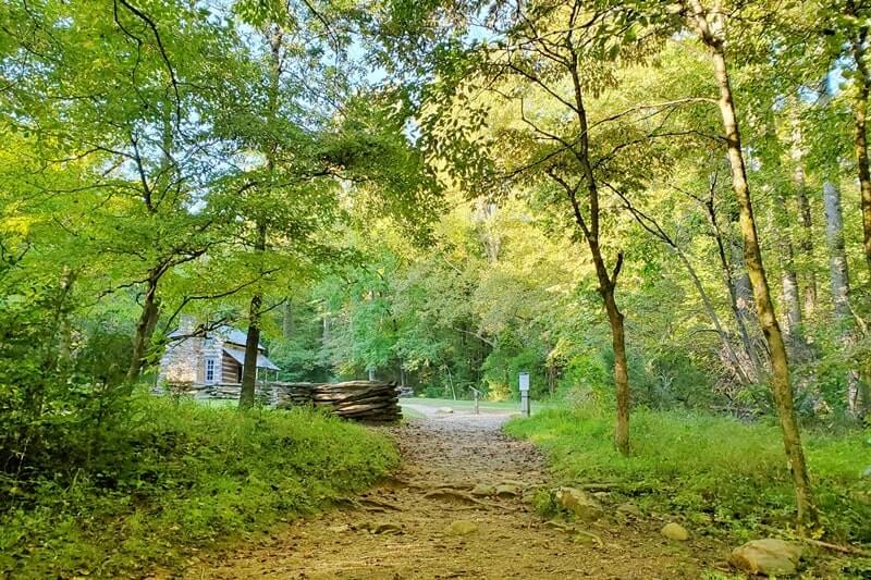 Hiking trail to John Oliver Cabin. Cades Cove hiking trail. smoky mountains travel blog