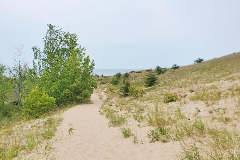 Beach trail to Sleeping Bear Point beach, Lake Michigan beach. michigan travel blog
