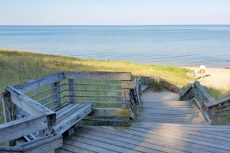 Stairs to beach. Lake Michigan overlook. Lake Michigan beach access. Muskegon State Park camping, Lake Michigan campground. michigan travel blog