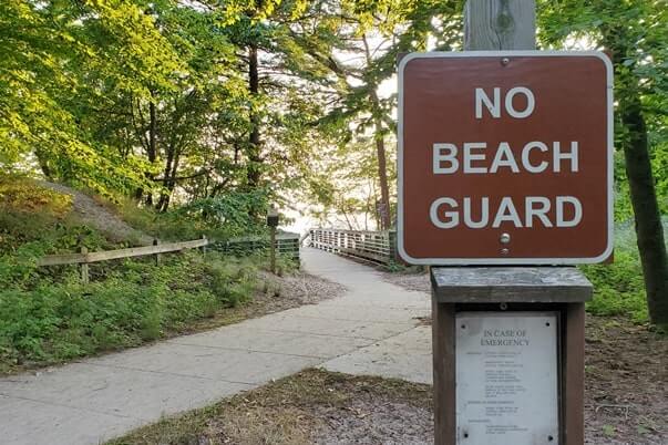 Muskegon State Park camping near Lake Michigan beach swimming. no lifeguard in muskegon state park, lake michigan campground. michigan travel blog
