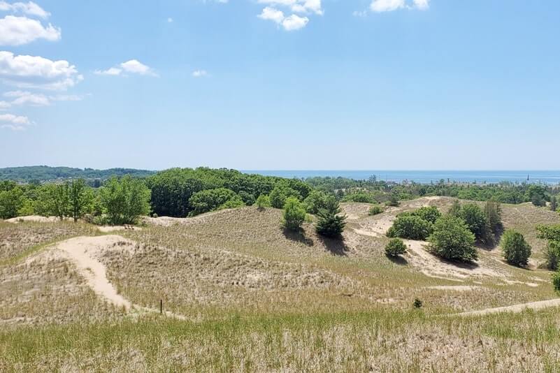 Lake Michigan campground near hiking trails. dune ridge trail sand dunes. muskegon state park camping. michigan travel blog