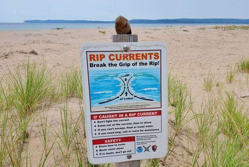 Things to do in Sleeping Bear Dunes: Lake Michigan swimming beach safety. michigan travel blog