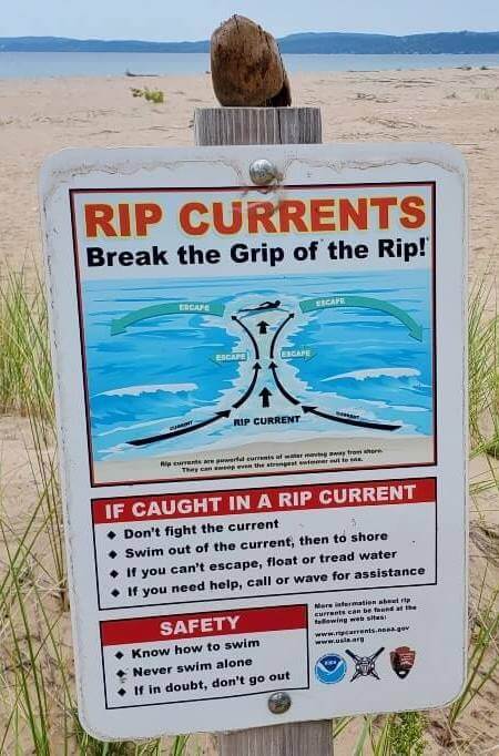 Things to do in Sleeping Bear Dunes: Lake Michigan swimming beach safety. michigan travel blog