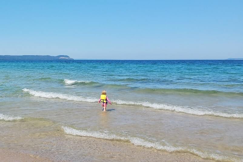 Things to do in Sleeping Bear Dunes: Lake Michigan swimming beach. michigan travel blog