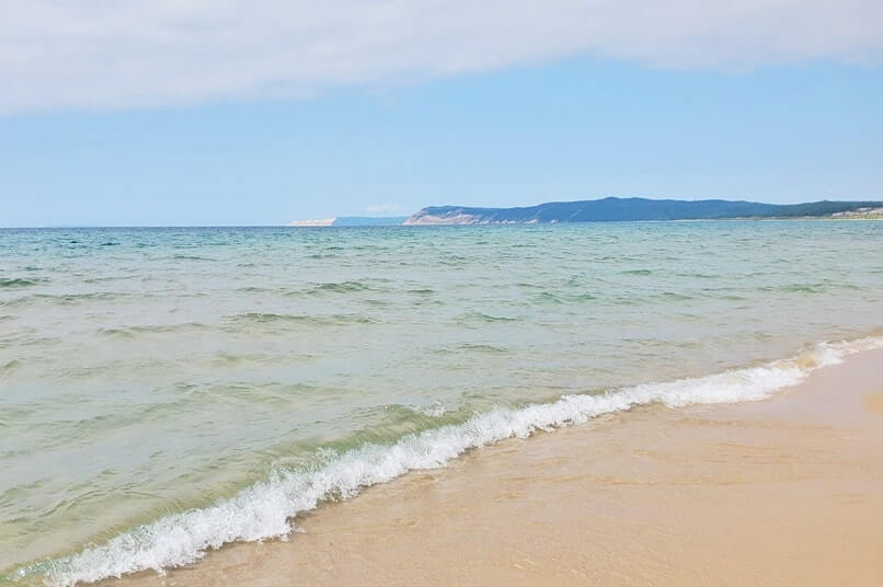 Lake Michigan. Things to do in Sleeping Bear Dunes: peterson beach. michigan travel blog