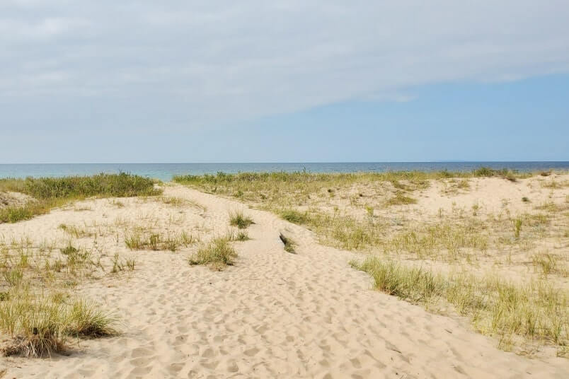 Michigan sand dunes. Things to do in Sleeping Bear Dunes: peterson beach sand dunes. michigan travel blog