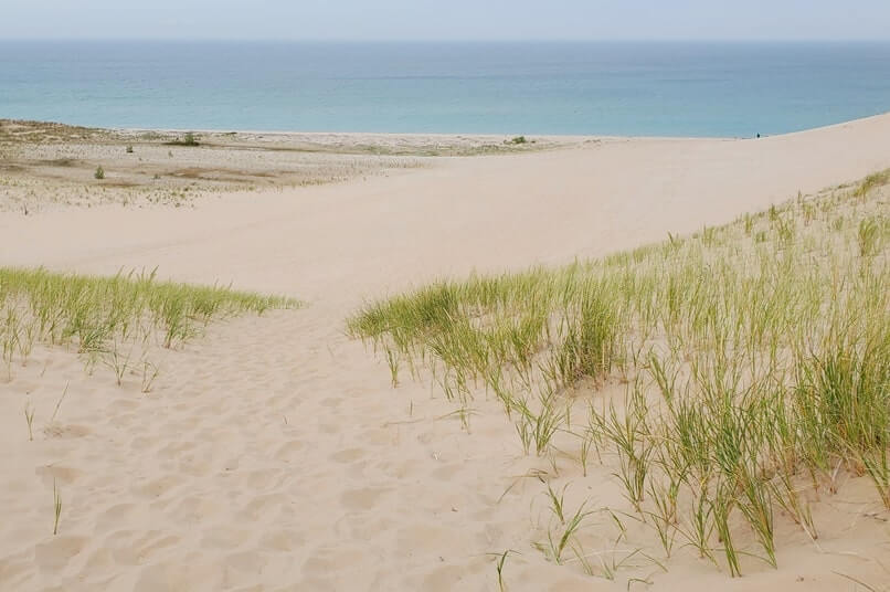 Best Michigan sand dunes along Lake Michigan. Things to do in Sleeping Bear Dunes: sleeping bear point. dune loop trail. michigan travel blog