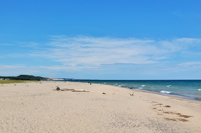 Grand Marais lighthouse beach near outer lighthouse pier. Lake Superior beach. up michigan travel blog