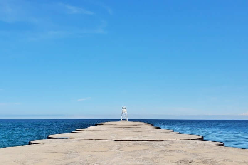 Grand Marais lighthouse. grand marais harbor of refuge outer lighthouse. lake superior lighthouses in michigan. Grand Marais MI. up michigan travel blog