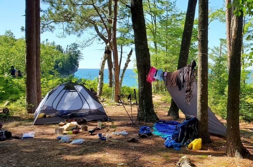 Best hikes in Pictured Rocks National Lakeshore: North Country Trail. backpacking pictured rocks. backpacking north country trail in michigan. backcountry camping in pictured rocks. lake superior. upper peninsula. up michigan travel blog