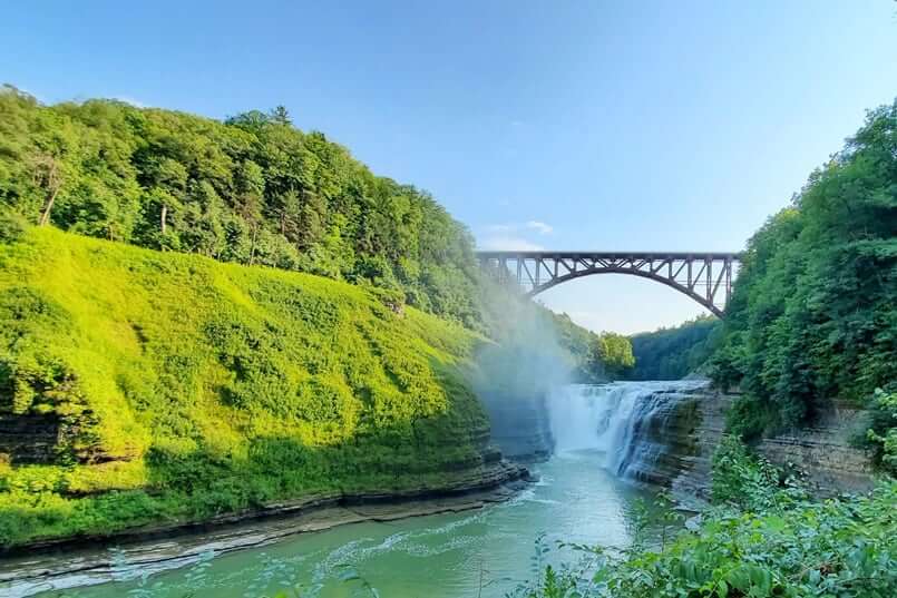 Upper Falls overlook trail, letchworth state park. waterfalls under the bridge. new york travel blog