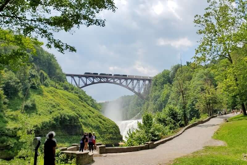 Upper Falls overlook trail, letchworth state park.Upper Falls parking. Upper Falls trailhead. letchworth gorge trail. waterfalls under the bridge. new york travel blog