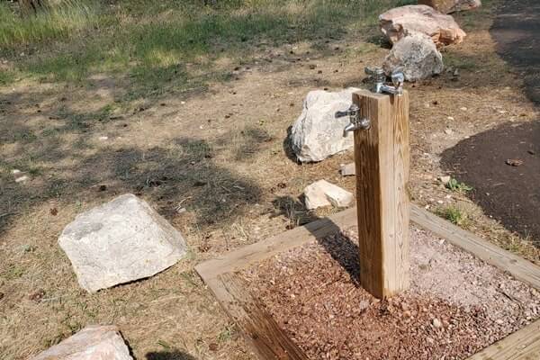 Jewel Cave drinking water in historic area near natural entrance. south dakota travel blog
