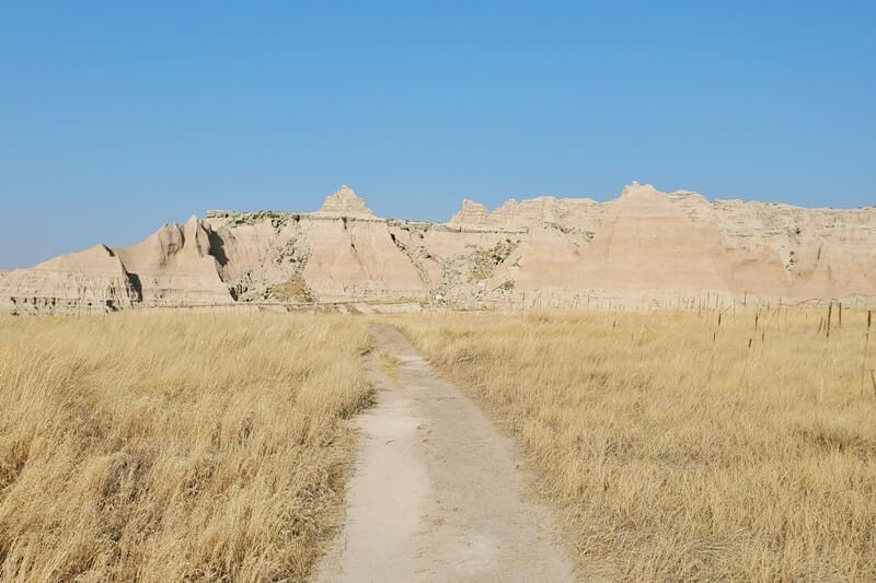 Where to start hiking the castle trail from old northeast road parking to door window notch. badlands national park. south dakota travel blog