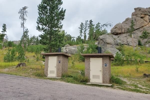 bathroom near Little Devils Tower Trailhead parking. Needles Highway bathroom. south dakota travel blog