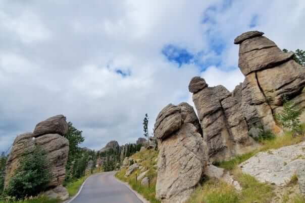 Driving to Little Devils Tower Trailhead parking along Needles Highway. custer state park. south dakota travel blog