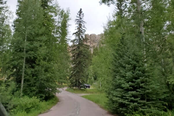 Getting to Little Devils Tower Trailhead parking along Needles Highway. road to little devils tower trailhead. custer state park. south dakota travel blog