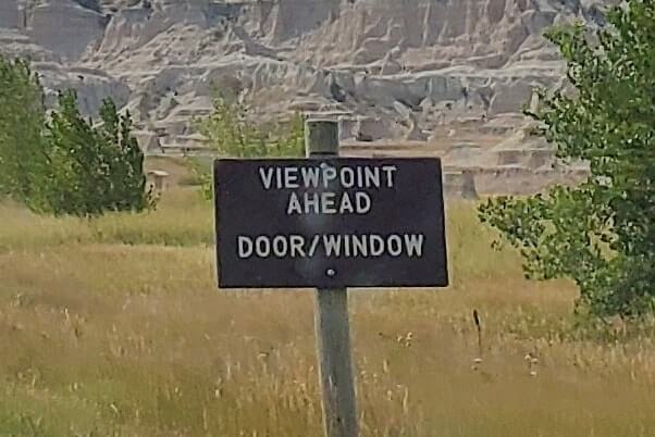 driving to window trail parking lot. driving badlands loop road to window trail parking. south dakota travel blog