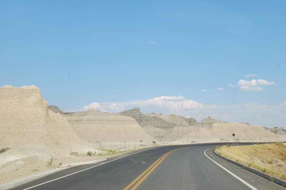 Driving Badlands Loop Road see yellow badlands. driving to yellow mounds overlook in Badlands National Park. sd travel blog