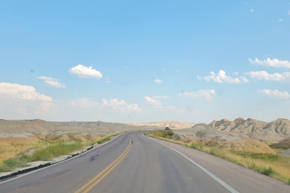 Driving Badlands Loop Road see yellow badlands. driving to yellow mounds overlook in Badlands National Park. sd travel blog