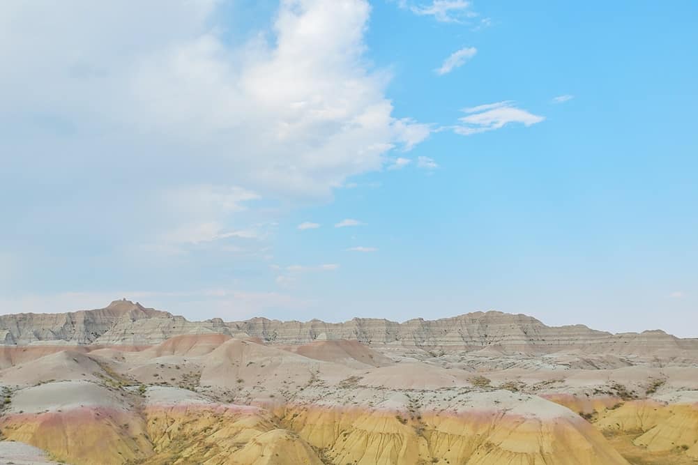 Where to see yellow badlands in South Dakota: Scenic drive along Badlands Loop Road in Badlands National Park. sd travel blog