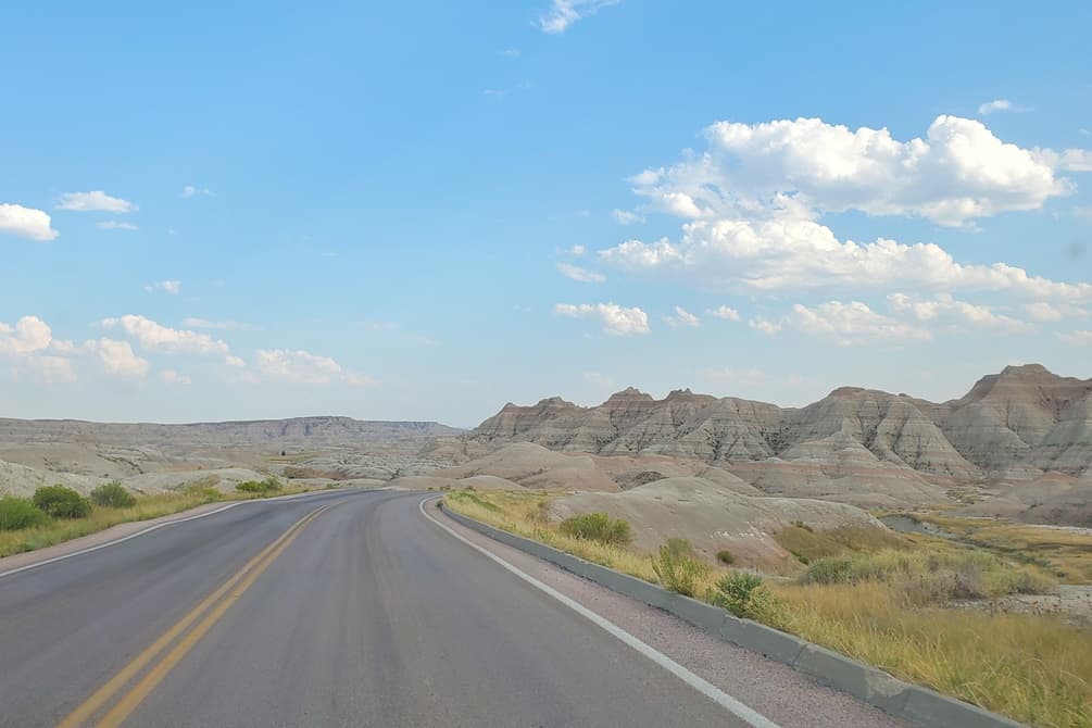 Driving Badlands Loop Road see yellow badlands. driving to yellow mounds overlook in Badlands National Park. sd travel blog