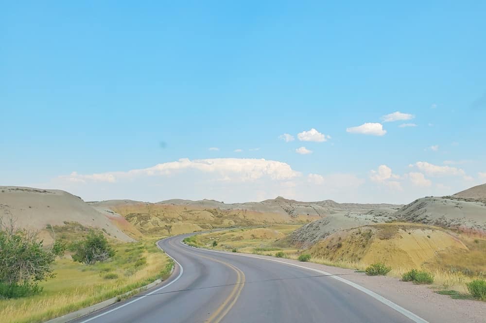 Where to see yellow badlands in South Dakota: Scenic drive along Badlands Loop Road in Badlands National Park. sd travel blog