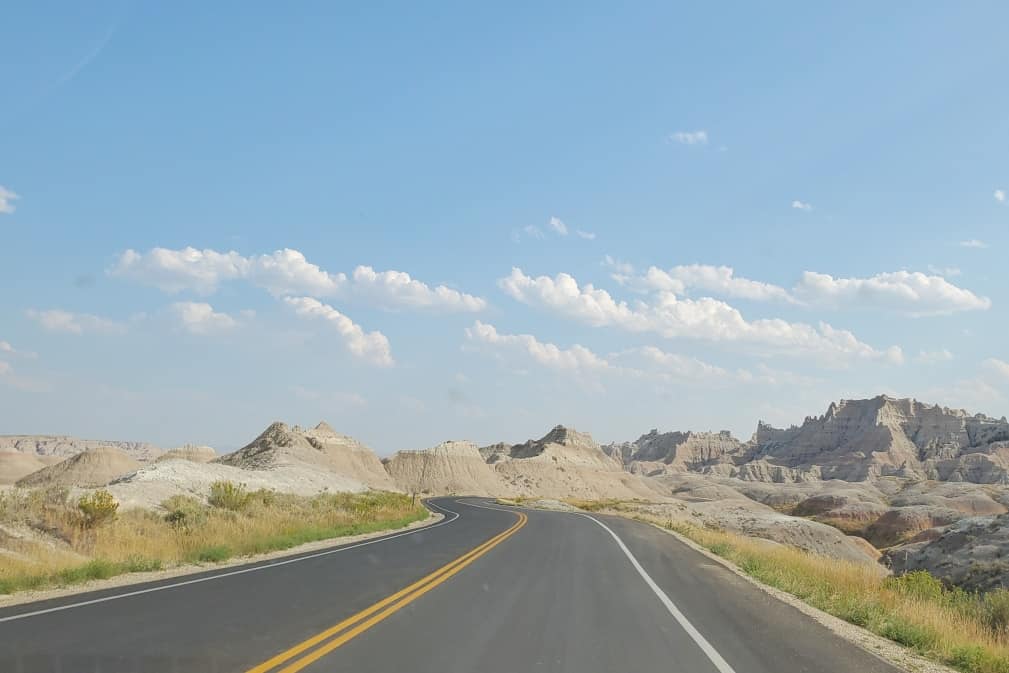 Driving Badlands Loop Road see yellow badlands. driving to yellow mounds overlook in Badlands National Park. sd travel blog