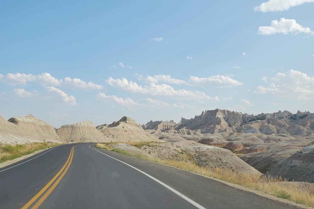 Driving Badlands Loop Road see yellow badlands. driving to yellow mounds overlook in Badlands National Park. sd travel blog