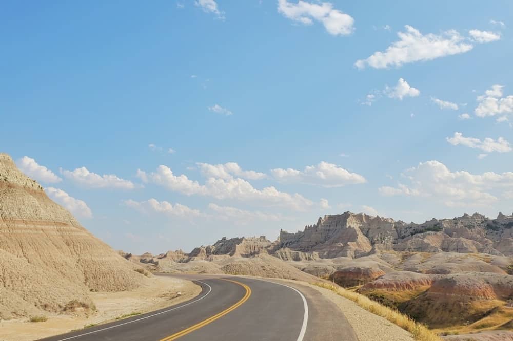 Driving Badlands Loop Road see yellow badlands. driving to yellow mounds overlook in Badlands National Park. sd travel blog