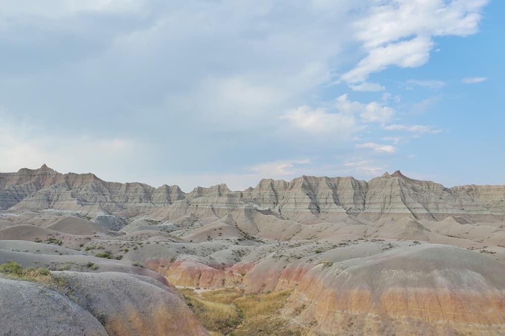 Where to see yellow badlands in South Dakota: Scenic drive along Badlands Loop Road in Badlands National Park. sd travel blog