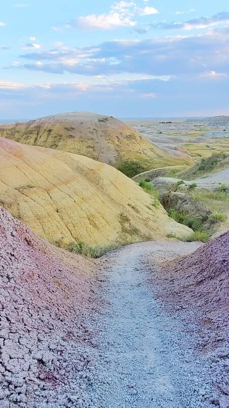 Hiking from Yellow Mounds Overlook. yellow mounds trail. Badlands National Park. sd travel blog
